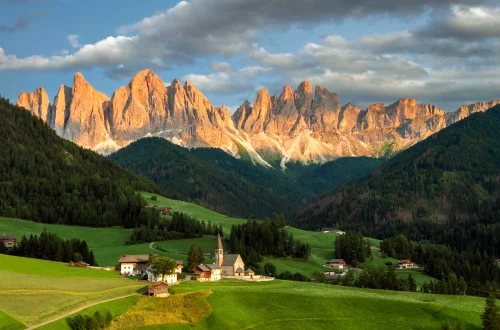 The Dolomites rise from the northeastern corner of Italy like a natural cathedral—vast, pale, and sculpted by millions of years.