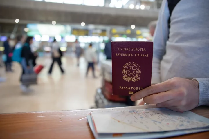 Photo of a person holding an european union passport