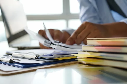 Person working on documents for a federal apostille