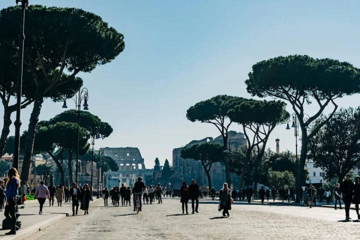 How to get residency in Italy: Photo of people walking in Via dei Fori Imperiali, Rome