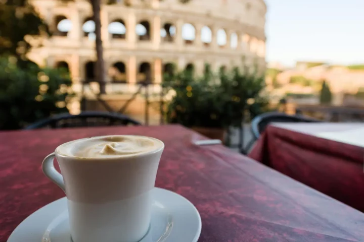 Mastering Italian coffee culture: Photo of a coffee cup near the Colosseum