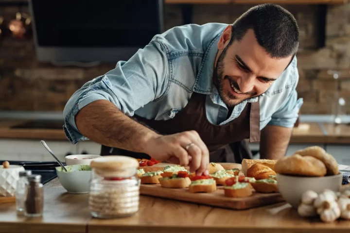 Italian culinary traditions: Photo of an Italian chef preparing a dish