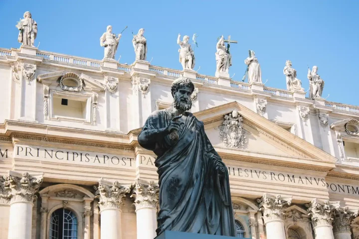 The role of the Catholic Church in shaping Italy’s history, culture, and identity: Close-up of statues in front of St. Peter’s Basilica, Vatican.