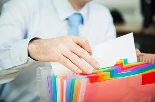 What is an apostille: Photo of a man searching for Italian citizenship documents in an apostille