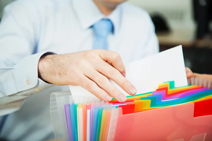 What is an apostille: Photo of a man searching for Italian citizenship documents in an apostille